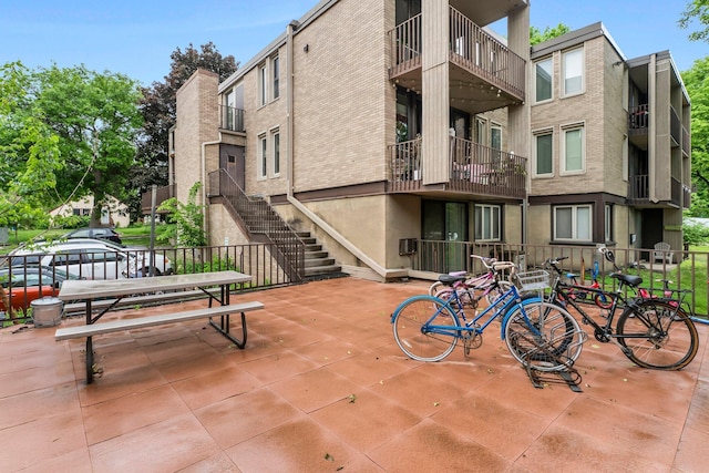 1405 40th St Unit 15F, Minneapolis, MN 55407 - view of patio featuring stairway