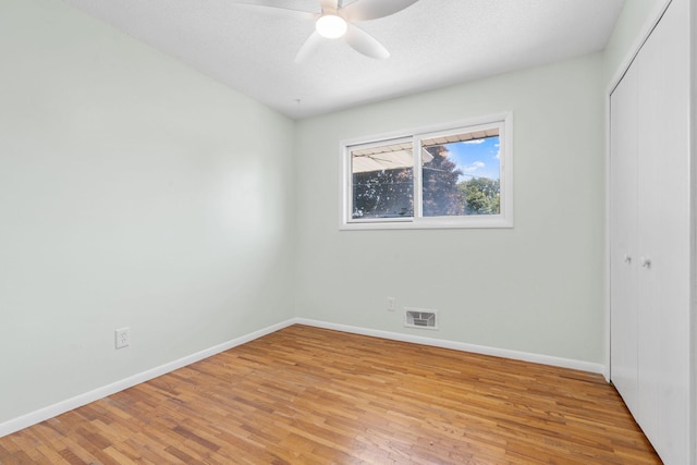 6540 Zealand Ave N, Brooklyn Park, MN 55428 - unfurnished room featuring a ceiling fan and light wood-type flooring
