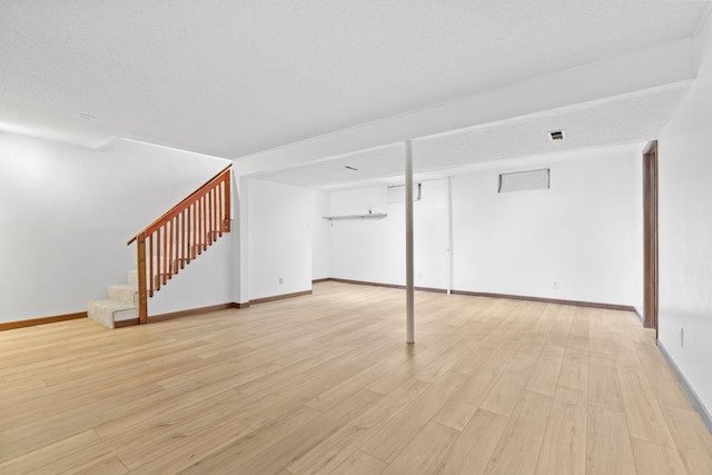 6540 Zealand Ave N, Brooklyn Park, MN 55428 - finished below grade area with stairway and light wood-style flooring