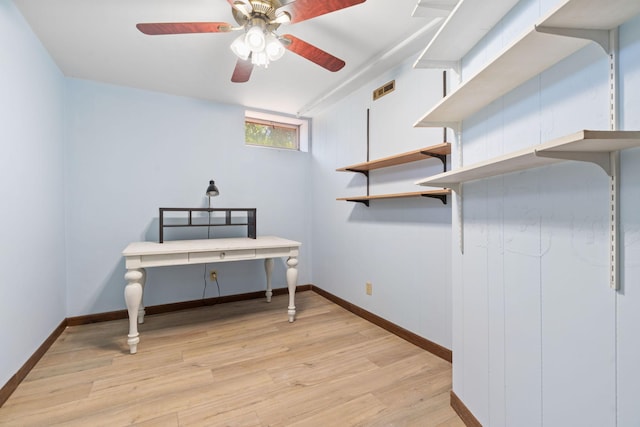6540 Zealand Ave N, Brooklyn Park, MN 55428 - basement with light wood-type flooring and a ceiling fan