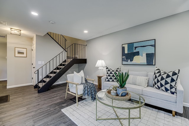 1034 Carmel Ct, Shoreview, MN 55126 - living room with baseboards, wood finished floors, stairway, and recessed lighting