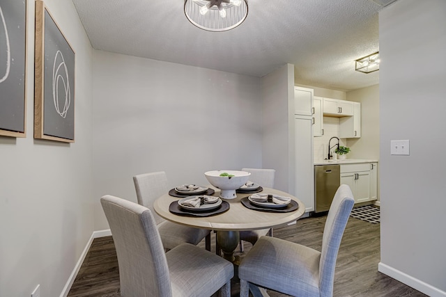 1034 Carmel Ct, Shoreview, MN 55126 - dining room with dark wood-style floors, baseboards, and a textured ceiling