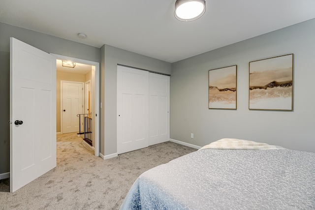 1034 Carmel Ct, Shoreview, MN 55126 - carpeted bedroom featuring a closet and baseboards