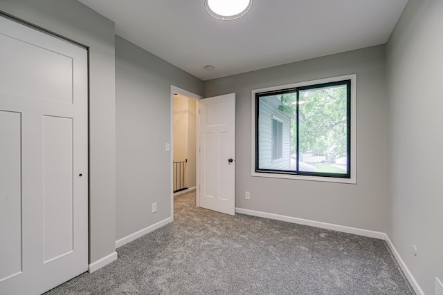 1034 Carmel Ct, Shoreview, MN 55126 - unfurnished bedroom with carpet and baseboards