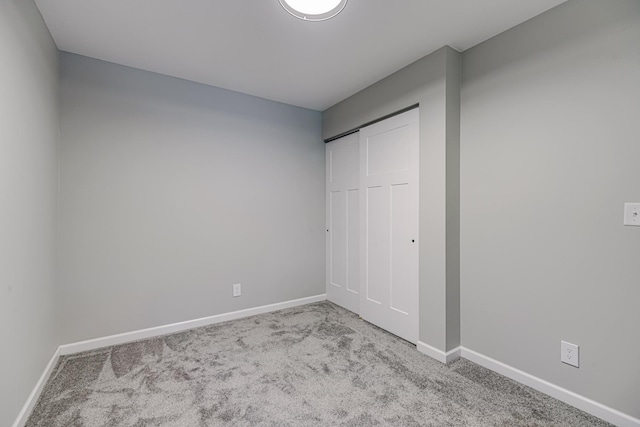 1034 Carmel Ct, Shoreview, MN 55126 - unfurnished bedroom featuring carpet floors, baseboards, and a closet