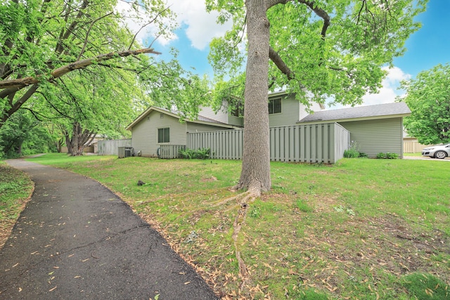 1034 Carmel Ct, Shoreview, MN 55126 - view of yard featuring central AC