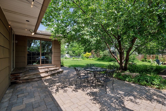 10933 Chowen Ave S, Bloomington, MN 55431 - view of patio / terrace featuring outdoor dining space