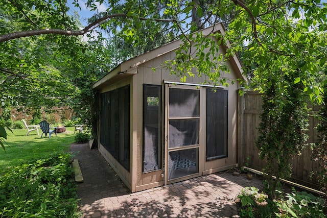 10933 Chowen Ave S, Bloomington, MN 55431 - view of outbuilding featuring a fire pit