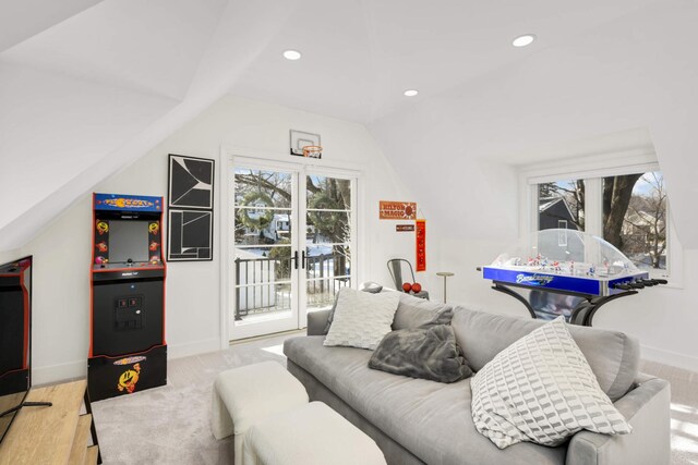 150 1st St, Excelsior, MN 55331 - living area featuring lofted ceiling, baseboards, and recessed lighting