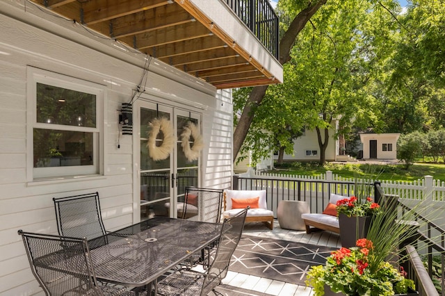 150 1st St, Excelsior, MN 55331 - wooden deck with outdoor dining space