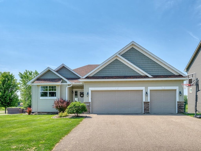 6024 158th St W, Apple Valley, MN 55124 - craftsman-style house with a front lawn, driveway, an attached garage, and stone siding