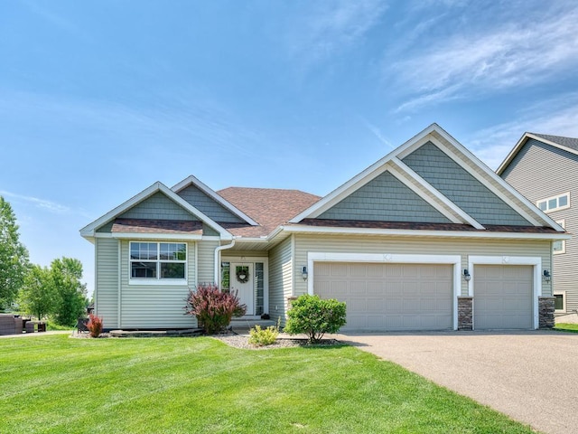 6024 158th St W, Apple Valley, MN 55124 - craftsman house featuring an attached garage, a front lawn, driveway, and roof with shingles