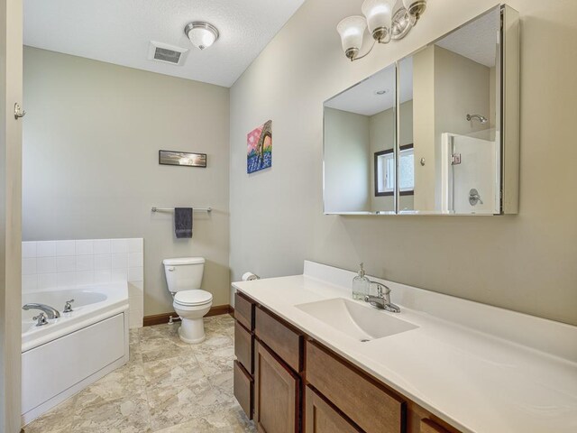 6024 158th St W, Apple Valley, MN 55124 - bathroom featuring a garden tub, vanity, toilet, a shower, and baseboards