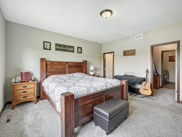 6024 158th St W, Apple Valley, MN 55124 - bedroom with light carpet and baseboards