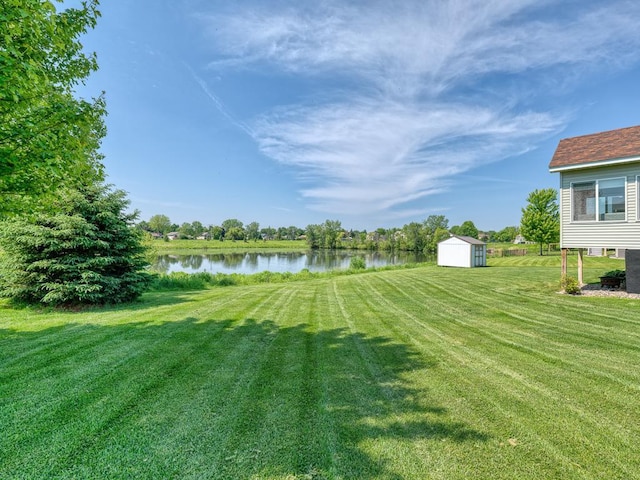 6024 158th St W, Apple Valley, MN 55124 - view of green lawn featuring a water view