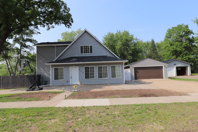 408 State St E, Grey Eagle, MN 56336 - view of front of home featuring a detached garage and an outbuilding
