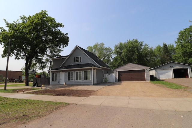 408 State St E, Grey Eagle, MN 56336 - traditional-style house with a garage and an outdoor structure