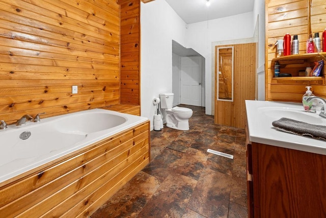408 State St E, Grey Eagle, MN 56336 - full bath featuring vanity, stone finish flooring, a bath, and toilet