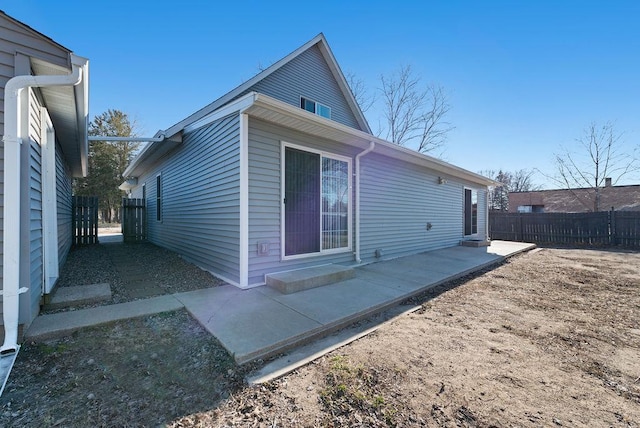 408 State St E, Grey Eagle, MN 56336 - rear view of house with a patio area and a fenced backyard