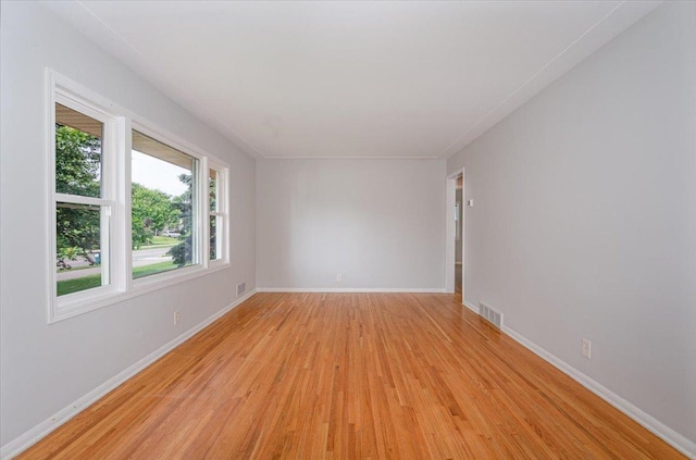 1637 37th Ave NE, Columbia Heights, MN 55421 - unfurnished room featuring light wood-type flooring and baseboards