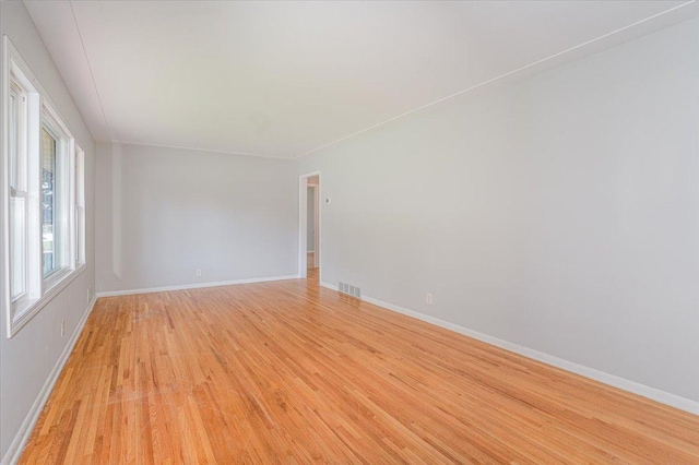 1637 37th Ave NE, Columbia Heights, MN 55421 - spare room featuring light wood finished floors and baseboards