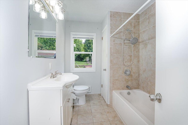 1637 37th Ave NE, Columbia Heights, MN 55421 - full bath with toilet, vanity, tub / shower combination, and tile patterned flooring