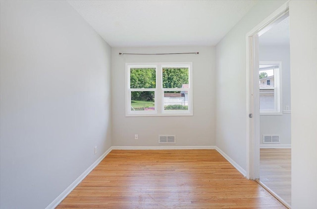 1637 37th Ave NE, Columbia Heights, MN 55421 - spare room with light wood-style floors and baseboards