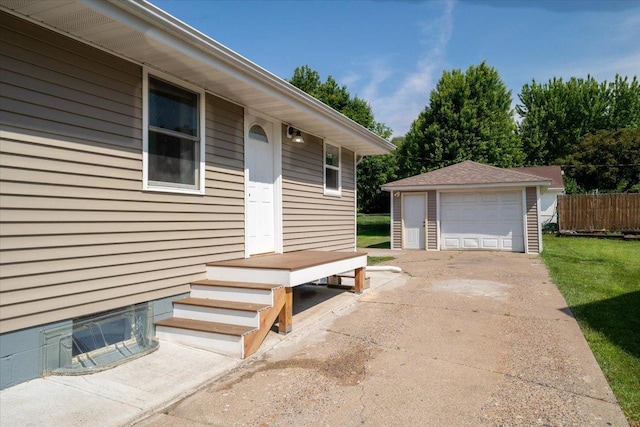 1637 37th Ave NE, Columbia Heights, MN 55421 - view of side of home with an outbuilding and a garage