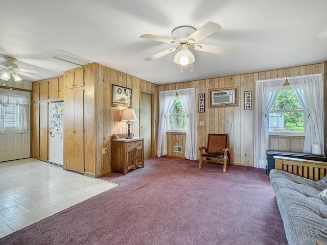 46427 Cambridge Dr, Stanchfield, MN 55080 - foyer with ceiling fan, wooden walls, an AC wall unit, healthy amount of natural light, and baseboards