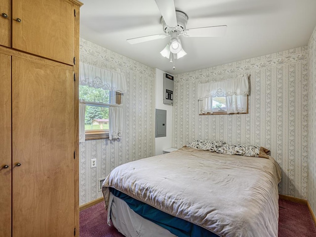 46427 Cambridge Dr, Stanchfield, MN 55080 - carpeted bedroom with electric panel, wallpapered walls, ceiling fan, and baseboards