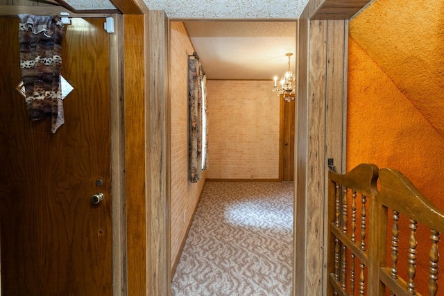 1700 Case Ave E, Saint Paul, MN 55106 - hall featuring a chandelier and a textured ceiling