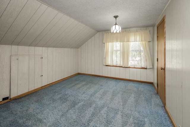 1700 Case Ave E, Saint Paul, MN 55106 - bonus room with carpet, lofted ceiling, a textured ceiling, and wood walls
