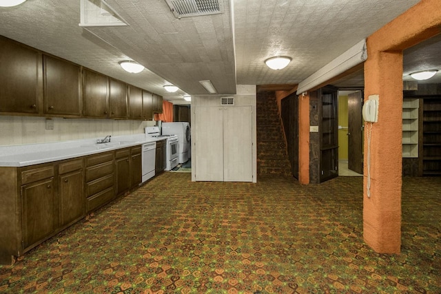 1700 Case Ave E, Saint Paul, MN 55106 - kitchen with white appliances, a sink, and light countertops