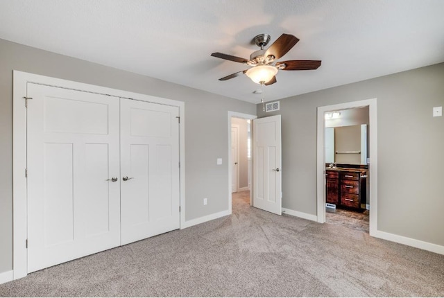 4781 261st St, Wyoming, MN 55092 - unfurnished bedroom featuring light colored carpet, baseboards, a closet, ensuite bath, and ceiling fan