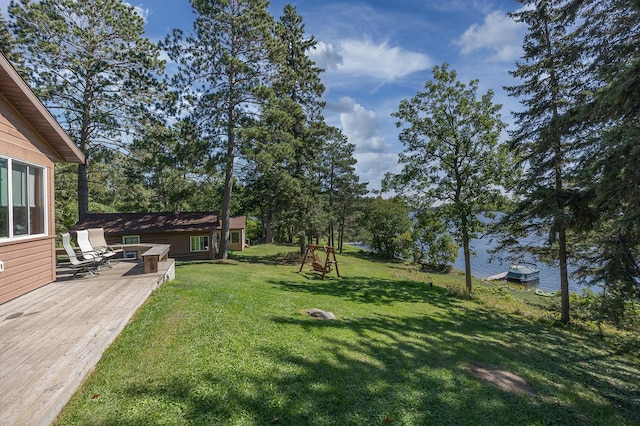 1409 Wabedo Pass Rd NE, Longville, MN 56655 - view of grassy yard with a deck