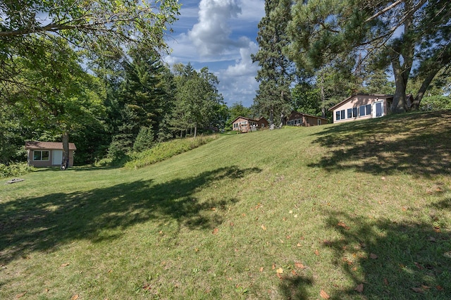 1409 Wabedo Pass Rd NE, Longville, MN 56655 - view of grassy yard featuring an outdoor structure