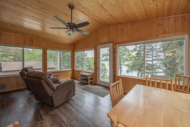 1409 Wabedo Pass Rd NE, Longville, MN 56655 - living room with wood walls, vaulted ceiling, dark wood-type flooring, ceiling fan, and wood ceiling