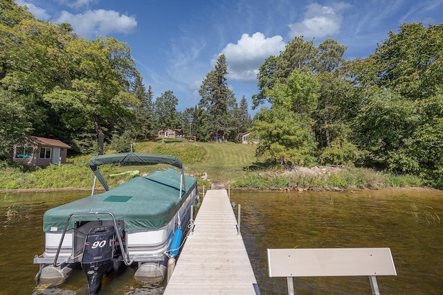 1409 Wabedo Pass Rd NE, Longville, MN 56655 - dock area featuring a water view and view of scattered trees