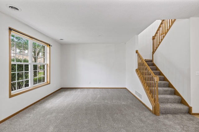 15481 Frost Path Unit 1803, Apple Valley, MN 55124 - unfurnished room featuring carpet floors and stairway