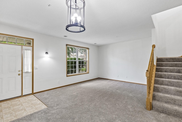 15481 Frost Path Unit 1803, Apple Valley, MN 55124 - carpeted entryway featuring stairway and baseboards