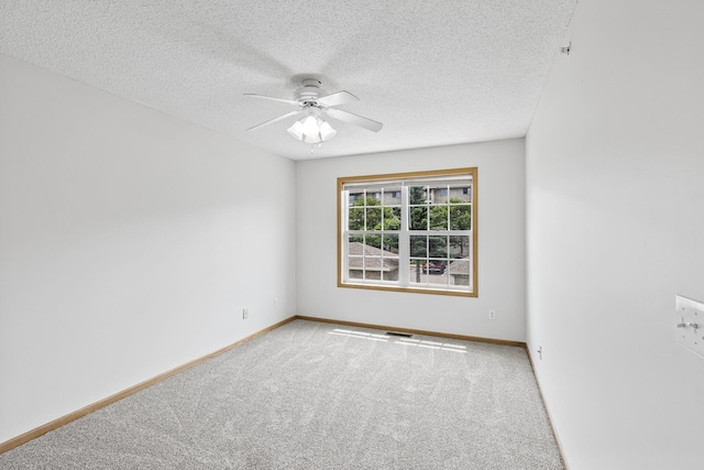 15481 Frost Path Unit 1803, Apple Valley, MN 55124 - unfurnished room featuring carpet floors, a ceiling fan, and a textured ceiling
