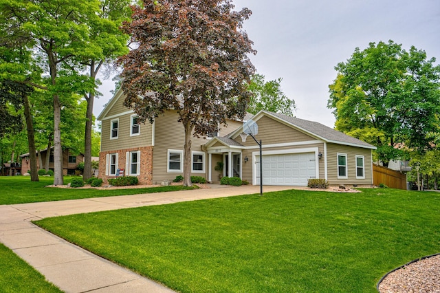 8517 143rd St W, Apple Valley, MN 55124 - view of front facade with brick siding, a garage, and driveway