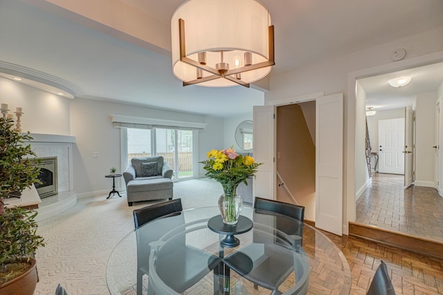 8517 143rd St W, Apple Valley, MN 55124 - dining room featuring baseboards and a fireplace