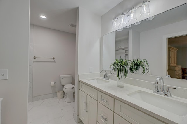 8517 143rd St W, Apple Valley, MN 55124 - full bath with marble finish floors, double vanity, toilet, recessed lighting, and baseboards