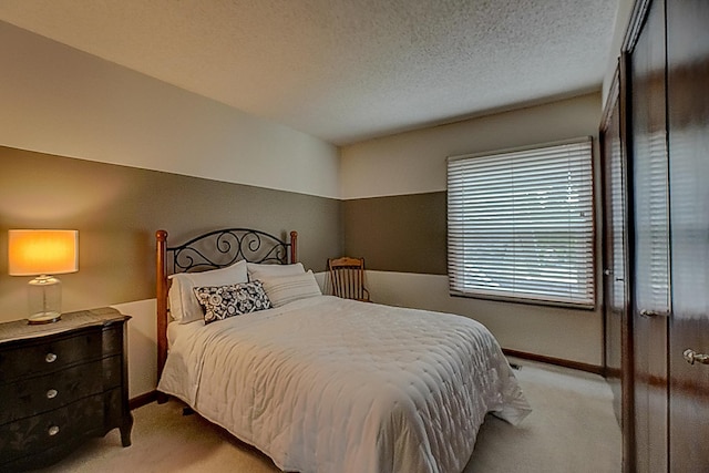 8517 143rd St W, Apple Valley, MN 55124 - bedroom with light colored carpet, baseboards, and a textured ceiling