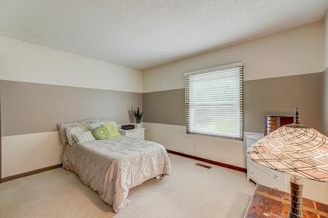 8517 143rd St W, Apple Valley, MN 55124 - carpeted bedroom featuring baseboards and a textured ceiling