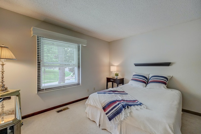 8517 143rd St W, Apple Valley, MN 55124 - carpeted bedroom featuring baseboards and a textured ceiling