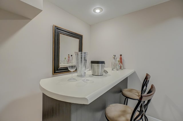 8517 143rd St W, Apple Valley, MN 55124 - indoor dry bar featuring baseboards
