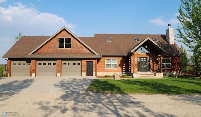 25712 15th Ave N, Highland Grove Twp, MN 56549 - view of front of property featuring concrete driveway, a chimney, a front yard, an attached garage, and log exterior
