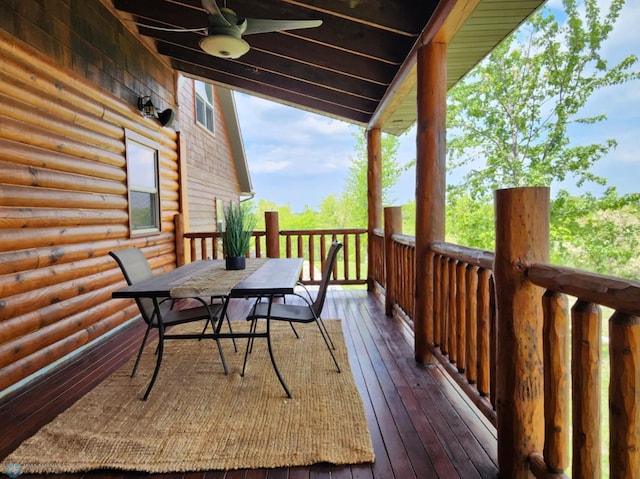 25712 15th Ave N, Highland Grove Twp, MN 56549 - wooden terrace featuring ceiling fan and outdoor dining area